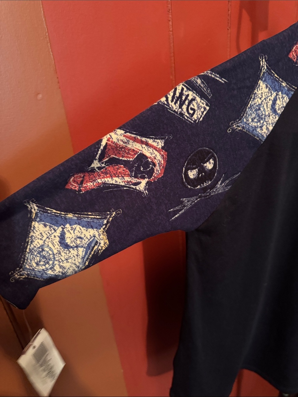 LuLaRoe Black Stretchy Tee with Nightmare Before Christmas Characters. - Picture 3 of 11